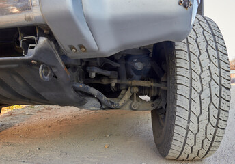 undercarriage of the front wheel of an SUV