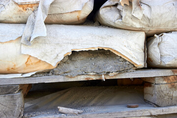 torn bag of loose cement