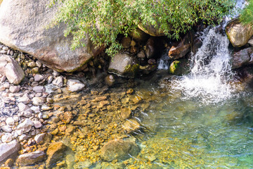 Small waterfall in the Great Himalayan National Park also known as GHNP. GHNP is the UNESCO world heritage site & a protected wildlife sanctuary.