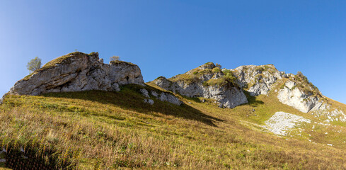 Naklejka premium Autumn mountains, a place for nature lovers and tourists on a Sunny day in the bosom of nature.