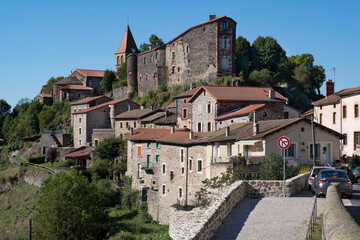 Fototapeta na wymiar Picturesque village of Saint Privat d'Allier in Auvergne in France with stone houses and a church