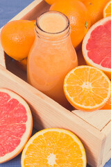 Fresh coctail or smoothie made of citrus fruits. Healthy dessert for diet and slimming