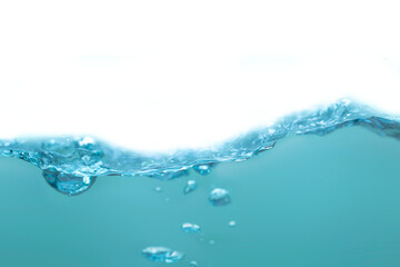 Naklejka na ściany i meble Water droplets moving in waves