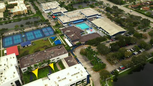Aerial video flyover and tilt up reveal Davie Florida USA