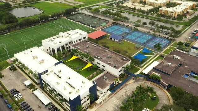 Aerial pull out reveal David Posnack Jewish School Davie FL United States