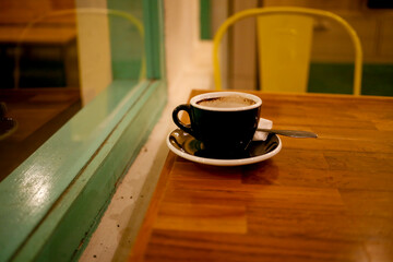 empty cup of coffee on wooden table