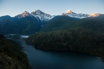 Beautiful landscape view of the sunrise shining on the mountains at Diablo Lake Overlook of North Cascades National Park in Washington state.