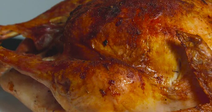Close-up, delicious, cooked, roasted turkey and veggies for Thanksgiving dinner.