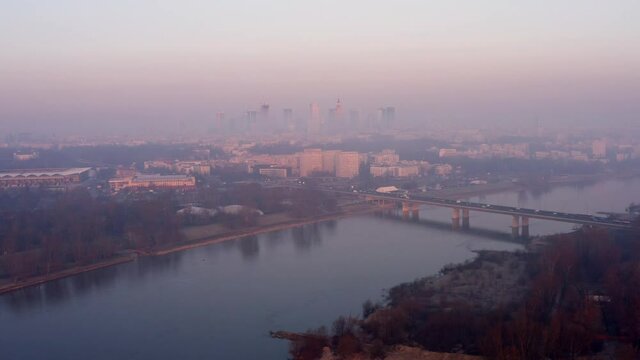 Purple sunrise over Warsaw with some smog obstructing visibility.