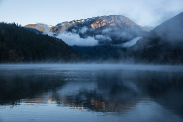 A foggy morning landscape in North Cascades National Park in Washington state.