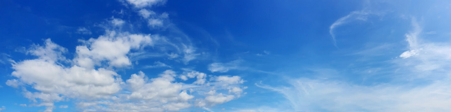 Panorama sky with beautiful cloud on a sunny day. Panoramic high resolution image.