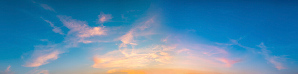Fototapeta na wymiar Panorama of Dramatic vibrant color with beautiful cloud of sunrise and sunset. Panoramic image.