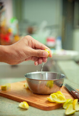 Hands that squeeze a lime