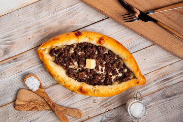 Georgian adjarian khachapuri with minced meat