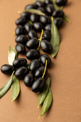 black olives background brown background