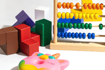 Children toys wooden colorful blocks, abacus and toys antistress donut unicorn