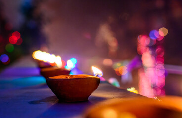 Diwali, Hindu festival of lights. Clay diya candle illuminated in Dipavali. 