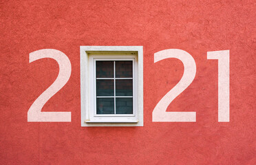 Happy new year 2021. Year 2021 on wall with window
