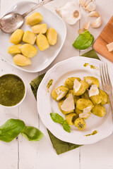 Potato gnocchi stuffed with pesto sauce.