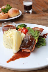 Grilled salmon with fresh vegetable salad