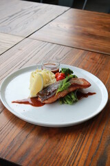 Grilled salmon with fresh vegetable salad