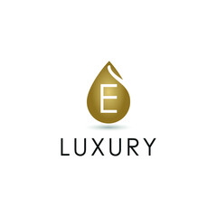 Initial Letter E in Luxury Golden Water drop / droplet icon. Cosmetic, salon, beauty, olive oil business logo vector concept
