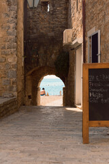 Holidays in Montenegro. Beach near the walls of the old Budva
