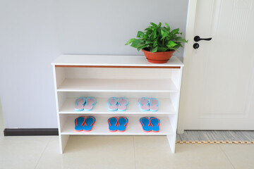 White shoe cabinet in the room