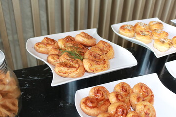 Fresh homemade bread on white plate.
