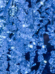 New Year's illumination, decoration of the city, houses, sale of illumination for the holidays. Glowing holiday lights.