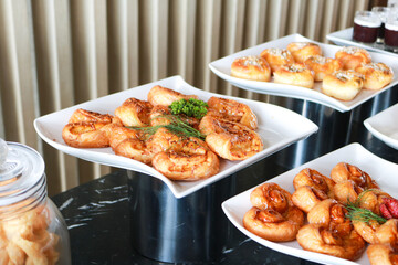 Fresh homemade bread on white plate.