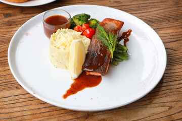 Grilled salmon with fresh vegetable salad