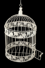 Vintage white empty bird cage with open door isolated on black background