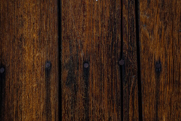 Fototapeta premium Aged wood texture, chips, cracks, nails in the surface, splinters, slats for construction, wooden canvases, beams with a relief, hollow, photophone for screensaver and printing