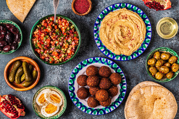 Fototapeta na wymiar Falafel and hummus - traditional dish of Israeli and Middle Eastern cuisine