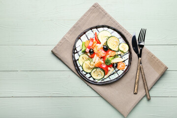 Plate with tasty pasta primavera on table