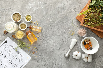 Alchemical symbols and ingredients for preparing potions on grunge background