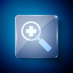 Fototapeta premium White Magnifying glass for search medical icon isolated on blue background. Hospital search. Square glass panels. Vector Illustration.