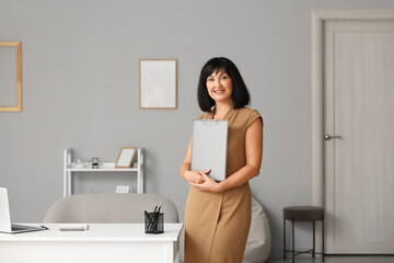 Portrait of female psychologist in office