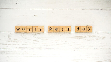 World Pets Day.words from wooden cubes with letters photo