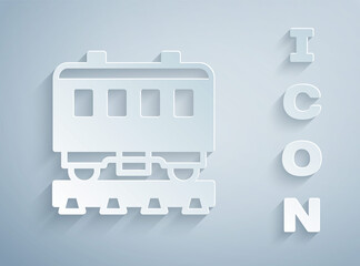 Paper cut Passenger train cars icon isolated on grey background. Railway carriage. Paper art style. Vector.