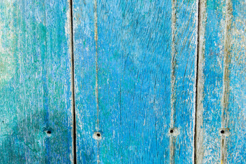 Wooden surface covered with splattered paint.