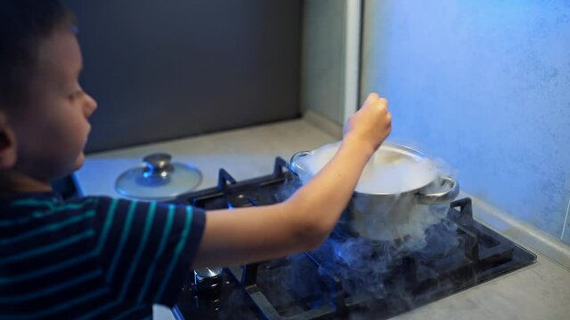 A little boy prepares a magic potion
