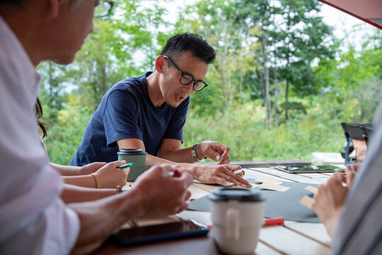 Man and Woman Having a Meeting on an Outdoor Office as New Normal Work Style