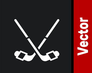 White Ice hockey sticks icon isolated on black background. Vector.