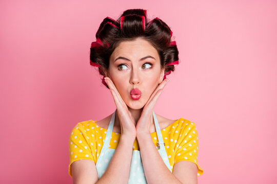 Close-up portrait of her she nice attractive pretty amazed housewife pout lips creating solution look aside isolated over pink pastel color background
