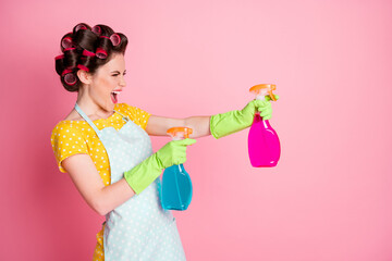 Profile side photo of funky girl spray bottle copyspace wear dotted t-shirt latex gloves isolated...