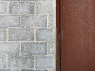 brown wooden door in brick wall for background