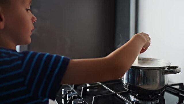 A little boy prepares a magic potion