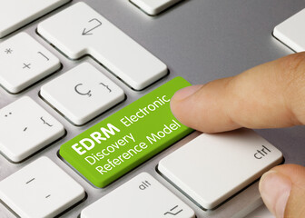 Electronic Discovery Reference Model - Inscription on Green Keyboard Key.
